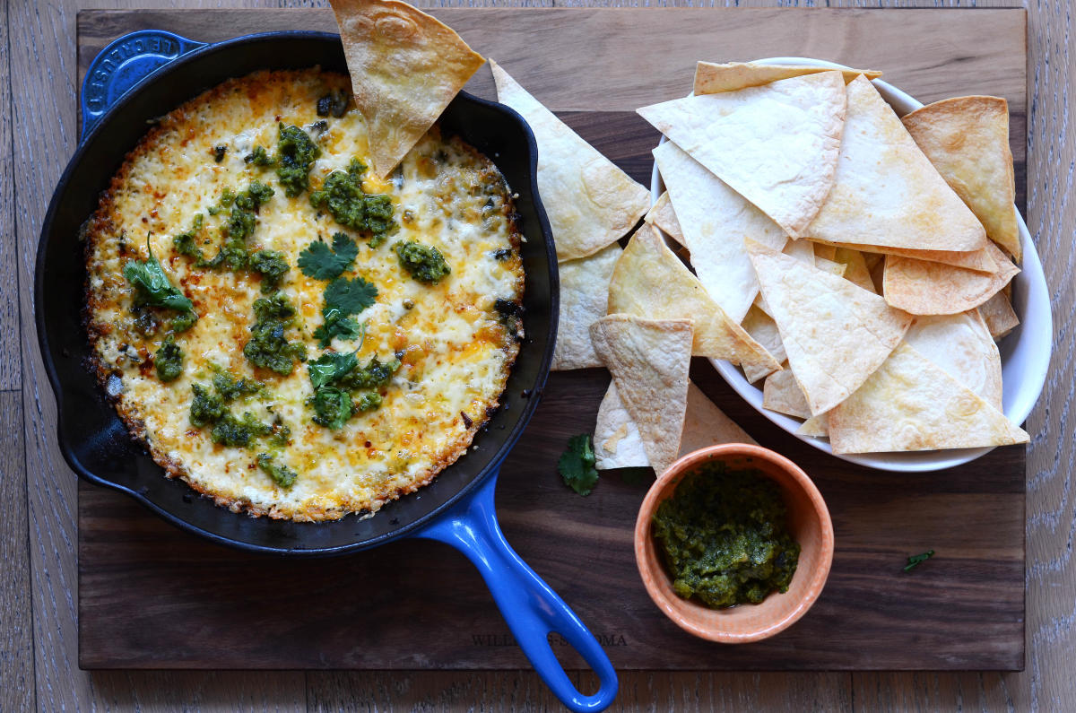 Queso Fundido With A Roasted Poblano and Lime Sauce