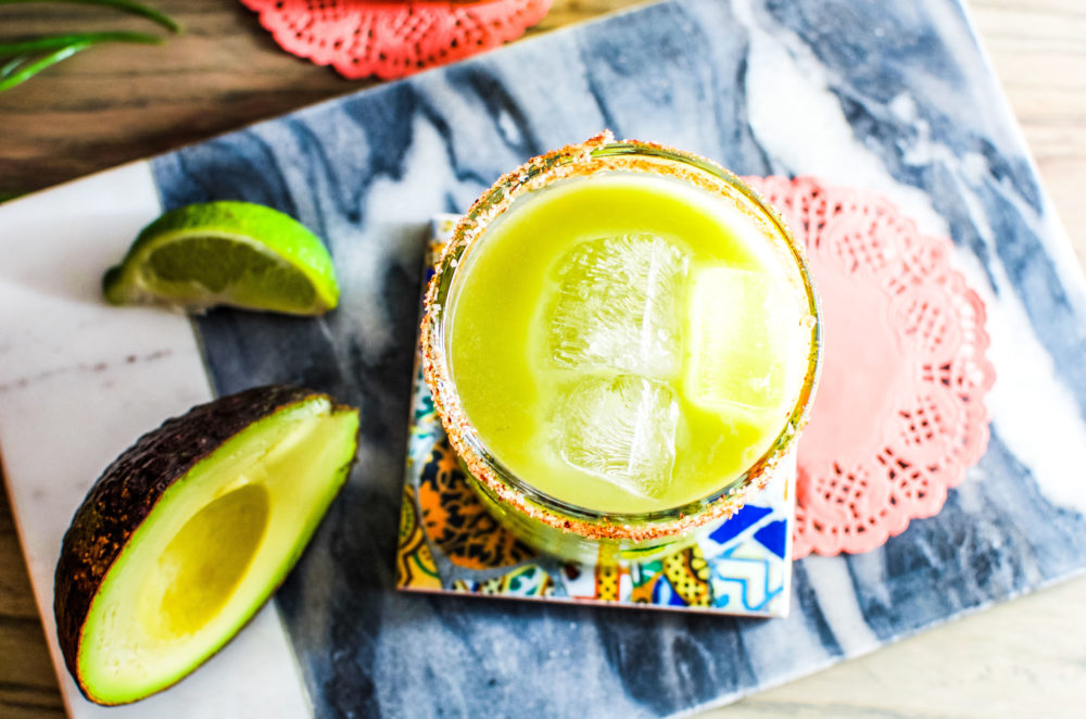 This avocado margarita recipe is perfect to drink all year round, but better enjoyed on a patio in the summer.