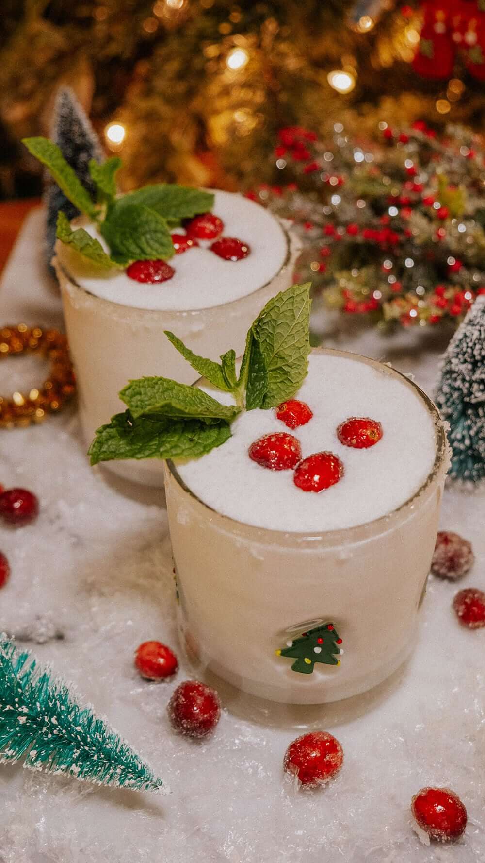 Merry Mistletoe Margarita in festive glasses garnished with mint